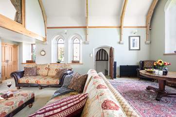 The super comfy sofas are the perfect place to relax after a day out and about exploring, with the door leading down to the kitchen/diner.