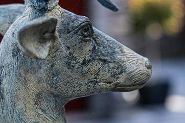 The statues in the garden are magical.