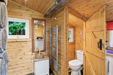 The WC is tucked away here with the shower tucked around the corner.