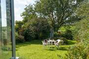 The pretty garden is a lovely place to relax.