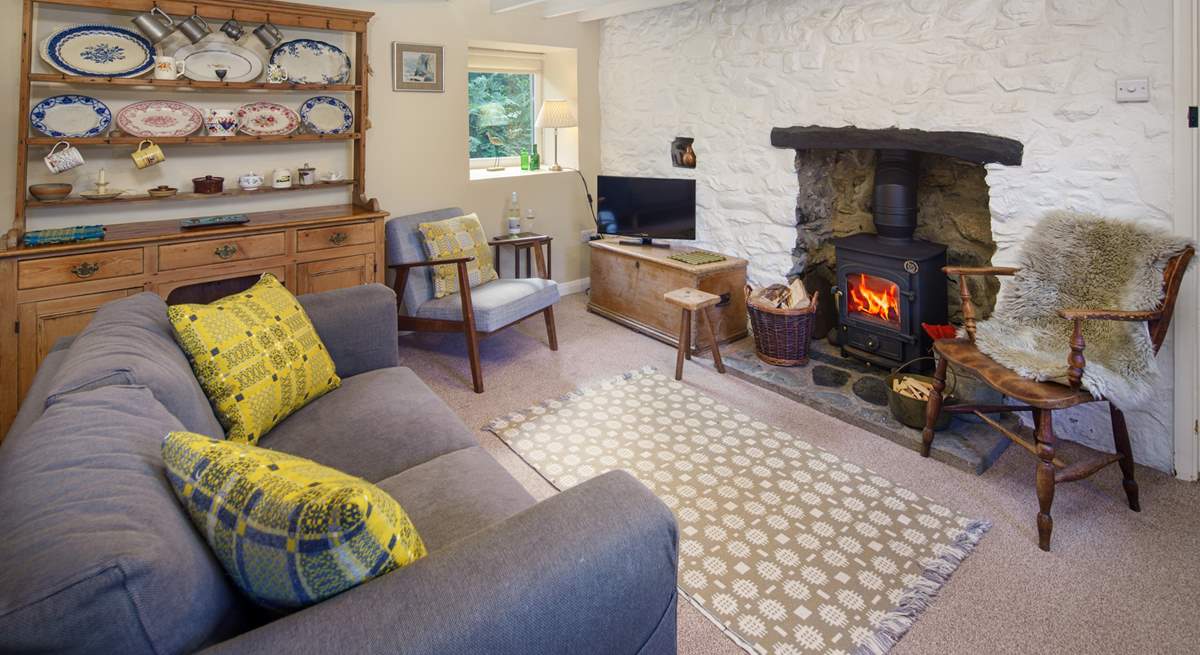 The sitting-room is full of charm and character - the perfect place to cosy up after exploring Pembrokeshire.