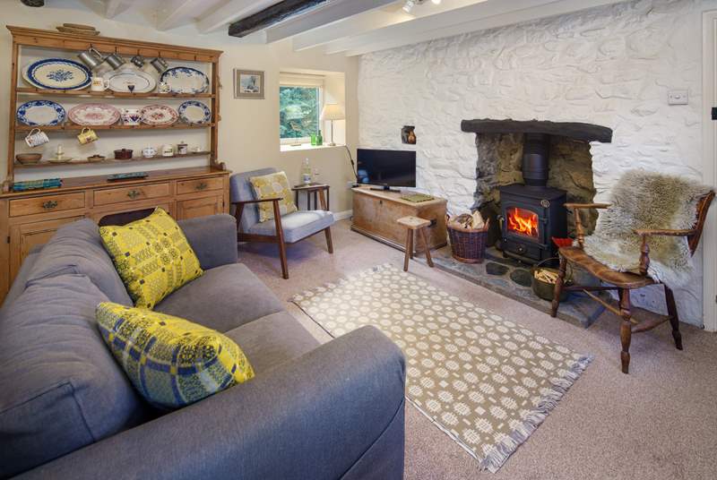The sitting-room is full of charm and character - the perfect place to cosy up after exploring Pembrokeshire.