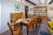 Gather around the dining-table for supper or ideal for board games.