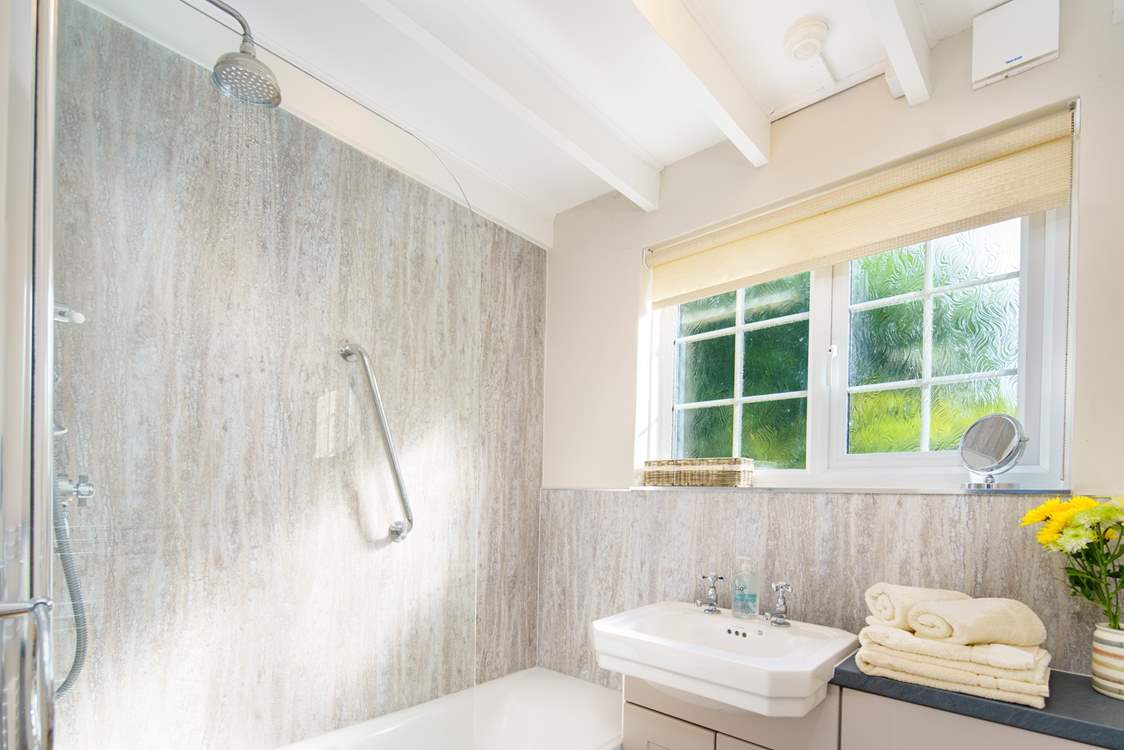 Beamed family bathroom. Take your pick, shower or leisurely bath.