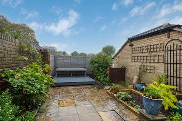 The fully enclosed outside space is great for kids and dogs and ideal for morning coffee in the sun.