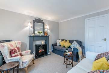 Sit back and unwind in the stylish living area.