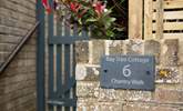 Once you've parked the car, the entrance to the property is through this gate. - Thumbnail Image