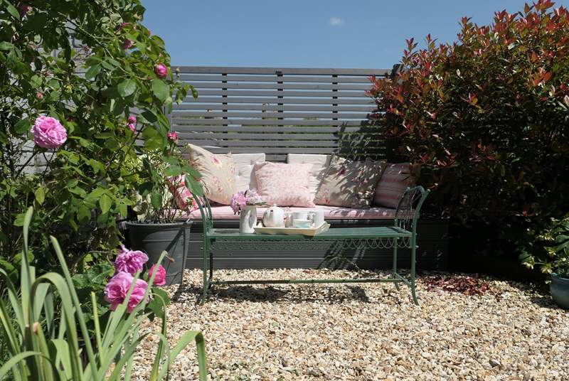 Step through the French Doors, into the perfectly designed garden space and soak up the sun.
