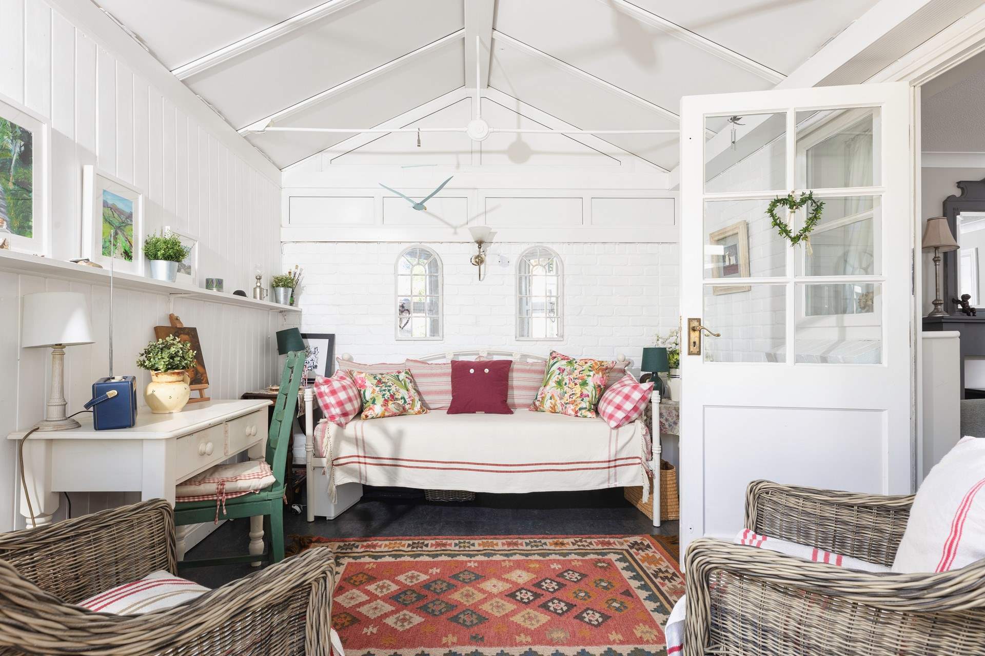 Escape with a book in the conservatory.