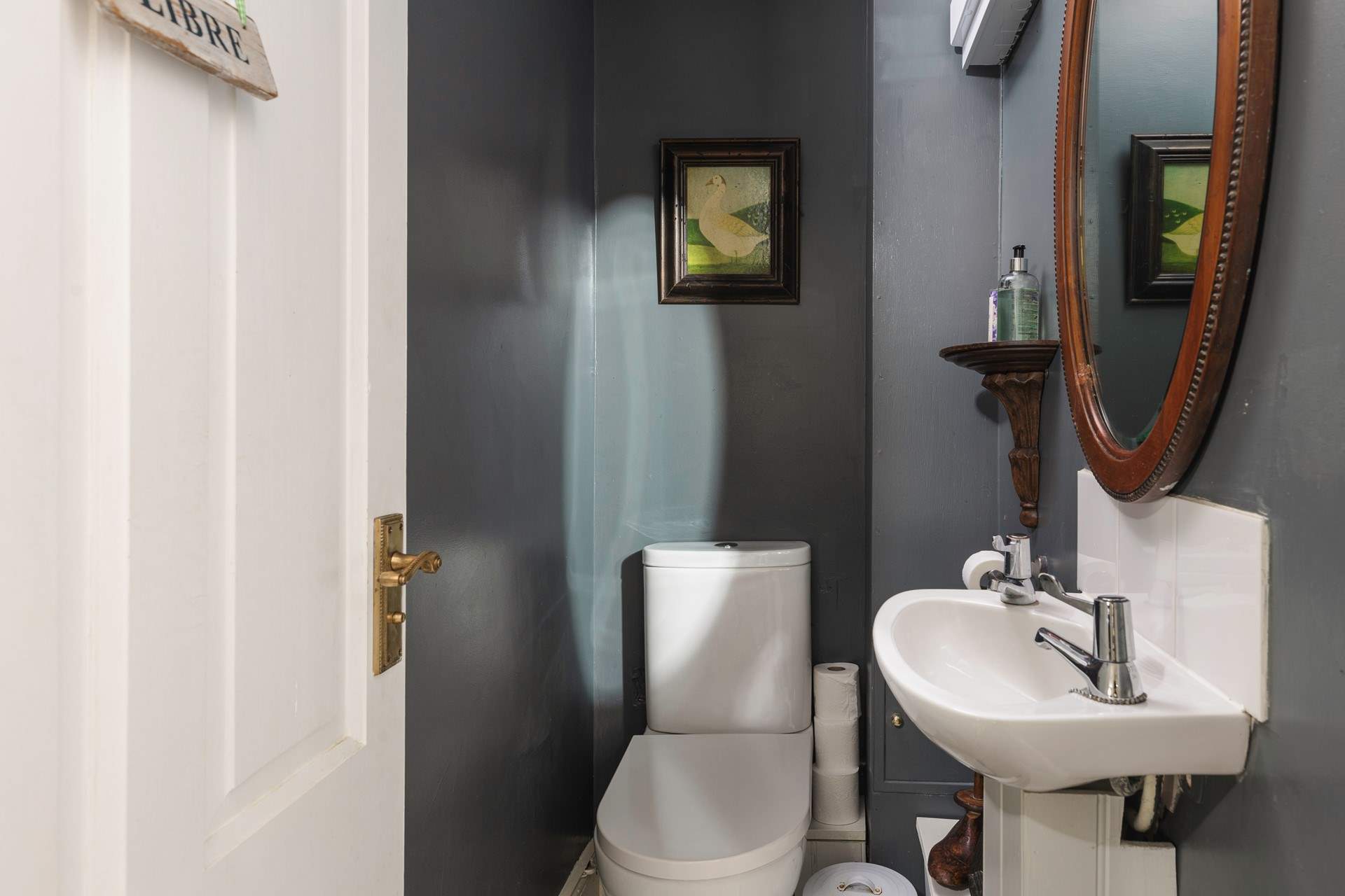 A handy downstairs cloakroom.