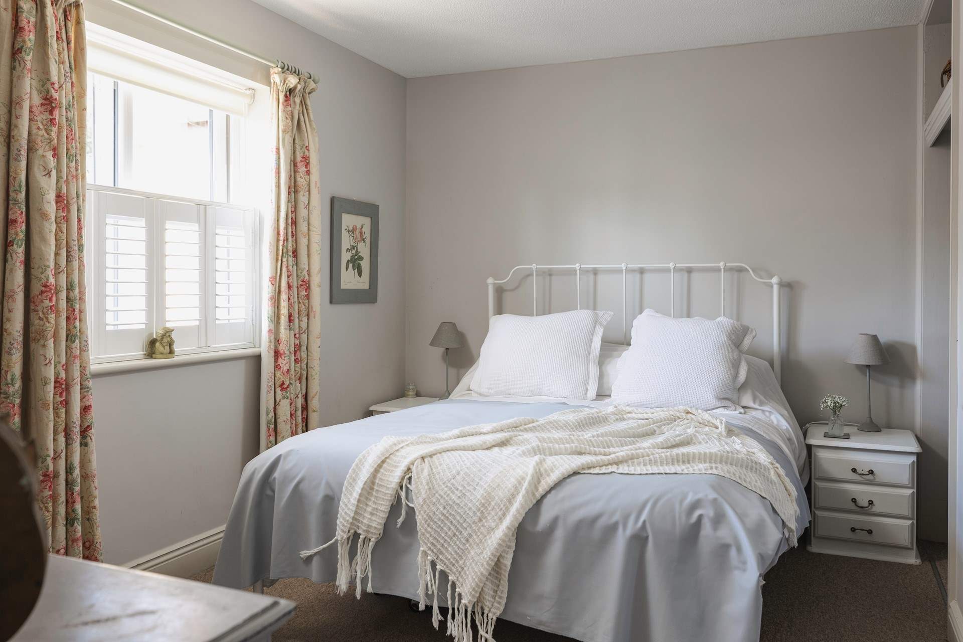 Bedroom 1 has calming tones.