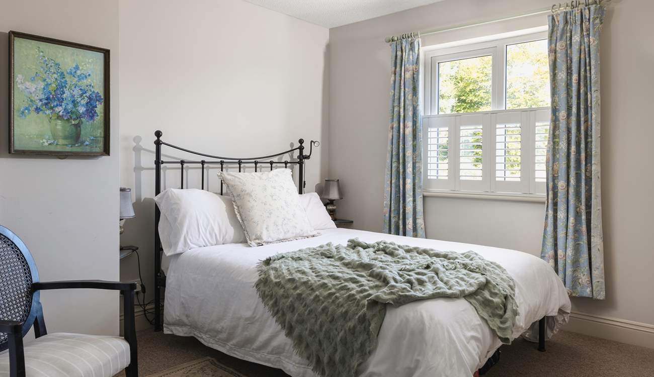 Bedroom 2 looks out over the garden.