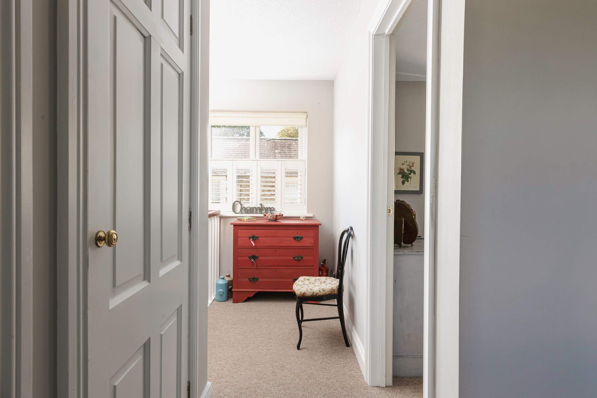The bedrooms and bathroom lead off the hallway.