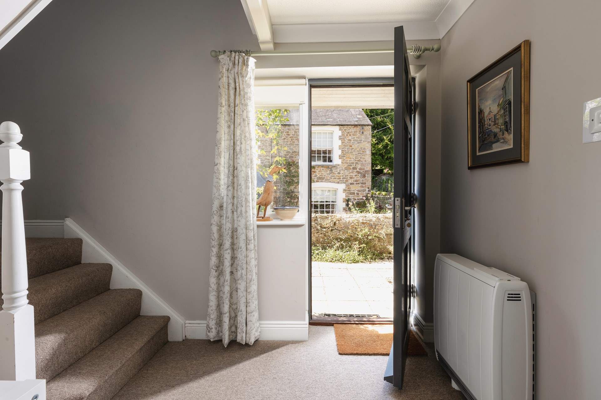 The front door leads on to the spacious hallway.