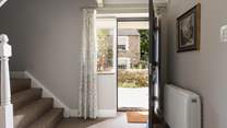 The front door leads on to the spacious hallway.