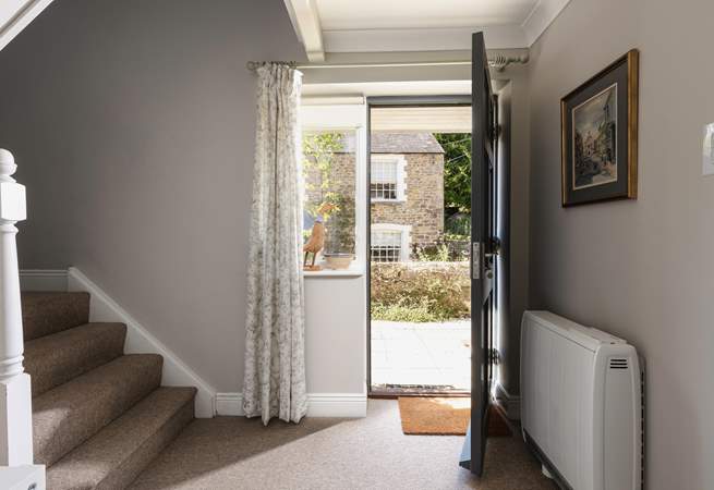 The front door leads on to the spacious hallway.