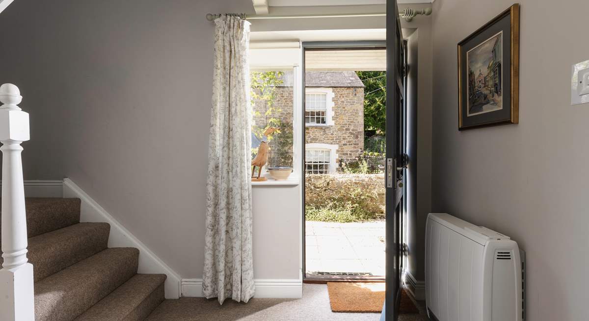 The front door leads on to the spacious hallway.