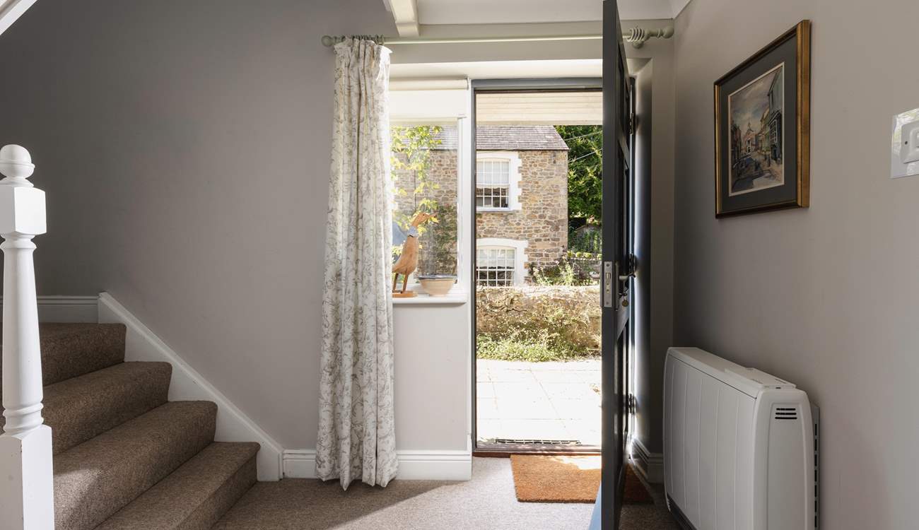 The front door leads on to the spacious hallway.