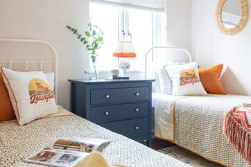 The twin bedroom on the first floor is beautifully furnished.