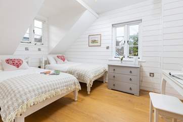 The pretty twin bedroom. Please be mindful of the sloping ceilings.