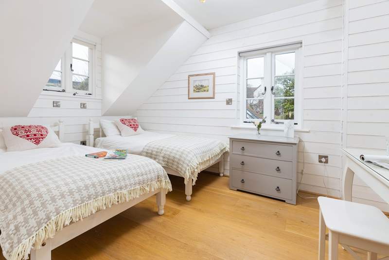 The pretty twin bedroom. Please be mindful of the sloping ceilings.