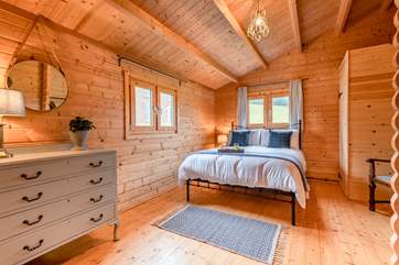 The spacious dual-aspect double bedroom.