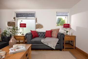 The exposed stonework is a reminder of the origins of this lovely holiday retreat.