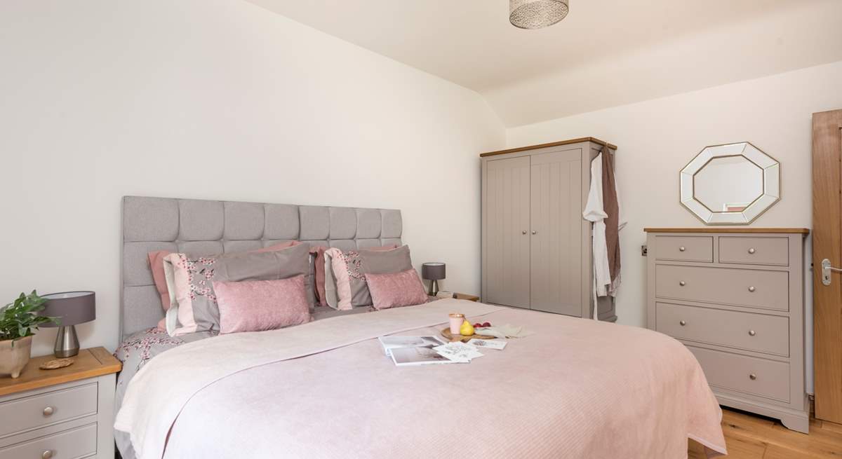 Calming pastel shades in the second bedroom.