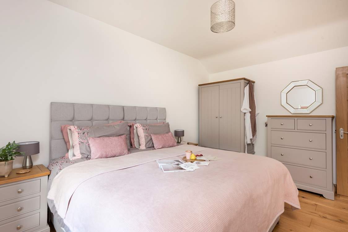 Calming pastel shades in the second bedroom.