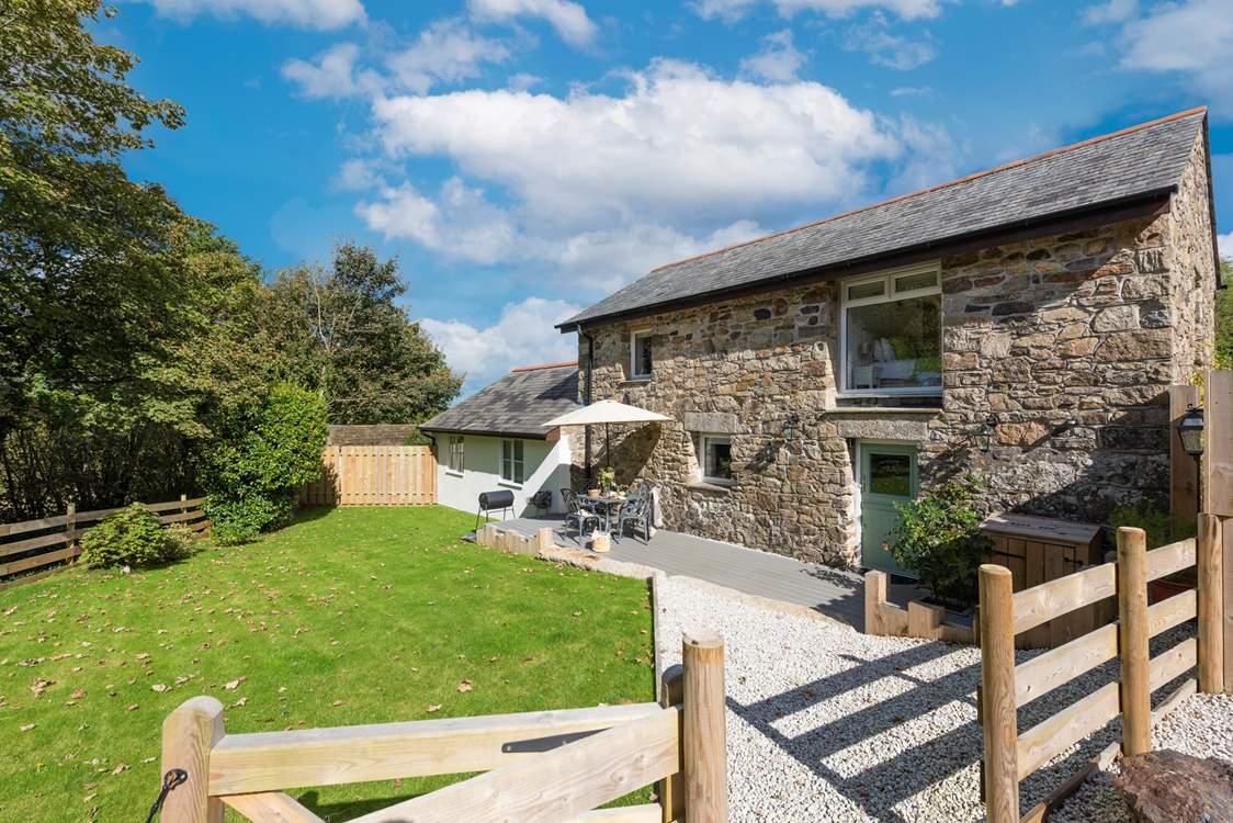 The garden and terrace are a lovely spot to enjoy the setting, whether firing up the barbecue, relaxing with a good book or soaking away all your stresses and strains in the hot tub (being installed Feb 22).
