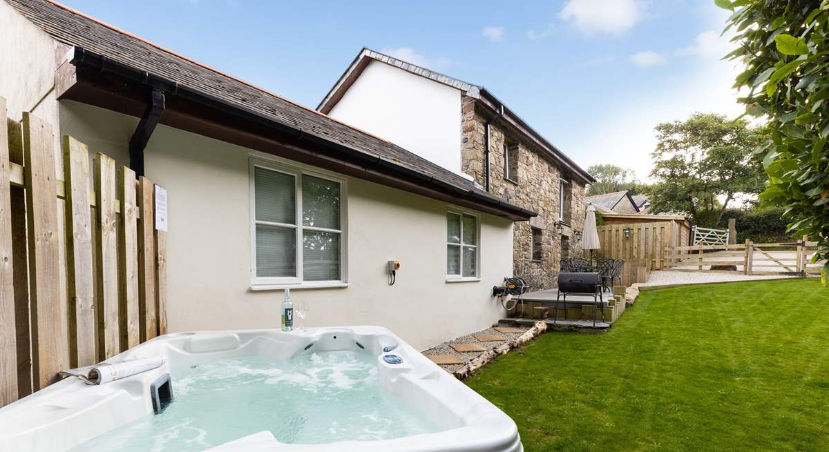 Chill out and relax in the bubbly hot tub