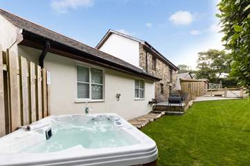 Chill out and relax in the bubbly hot tub