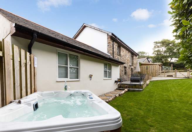 Chill out and relax in the bubbly hot tub