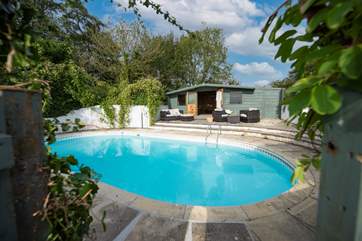 Treglyddins has a wonderful outdoor pool. To reach the pool area you have to walk through the orchard, and up five steps.