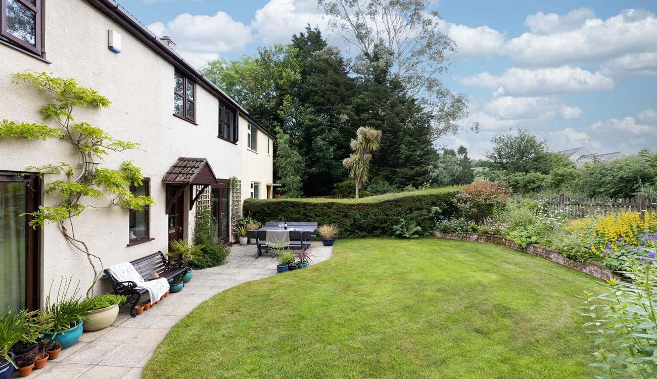 What a fabulous lawned area, perfect for the younger members of the family to let off steam in.