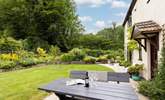 The garden offers the perfect spot to relax with a good book whilst the kids let off steam. - Thumbnail Image