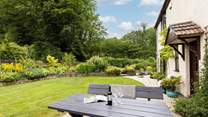 The garden offers the perfect spot to relax with a good book whilst the kids let off steam.