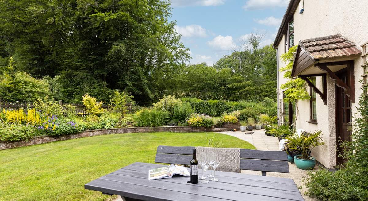 The garden offers the perfect spot to relax with a good book whilst the kids let off steam.