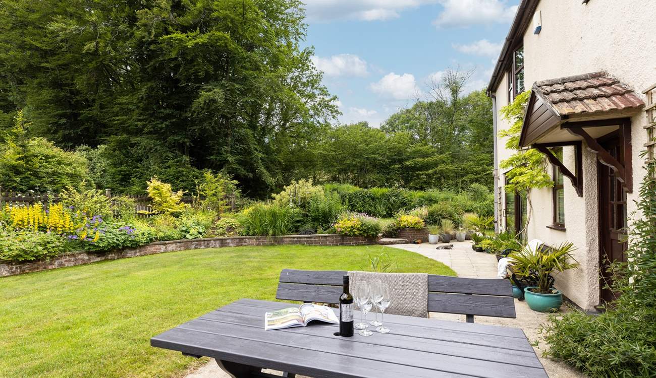 The garden offers the perfect spot to relax with a good book whilst the kids let off steam.