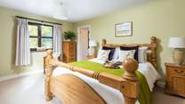 Bedroom one is light, airy and super spacious. Home to this king-size bed.