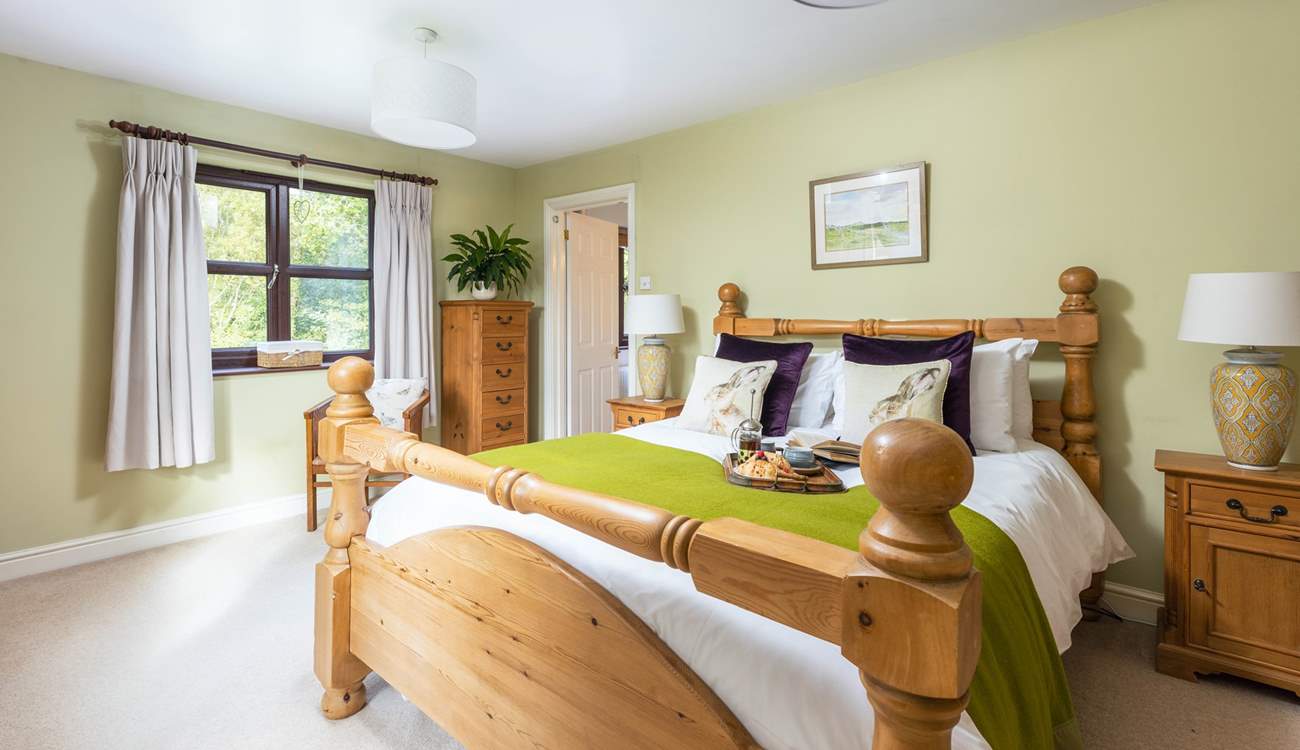 Bedroom one is light, airy and super spacious. Home to this king-size bed.