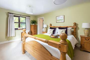 Bedroom one is light, airy and super spacious. Home to this king-size bed.
