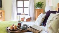 Start as you mean to go on. Relaxing in this beautiful bedroom is the best way to start the day.