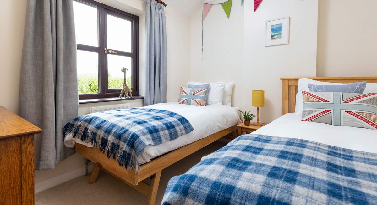 Bedroom four is home to these fabulous twin beds.