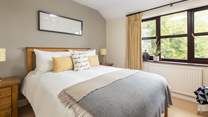Bedroom two is simply so pretty and inviting.