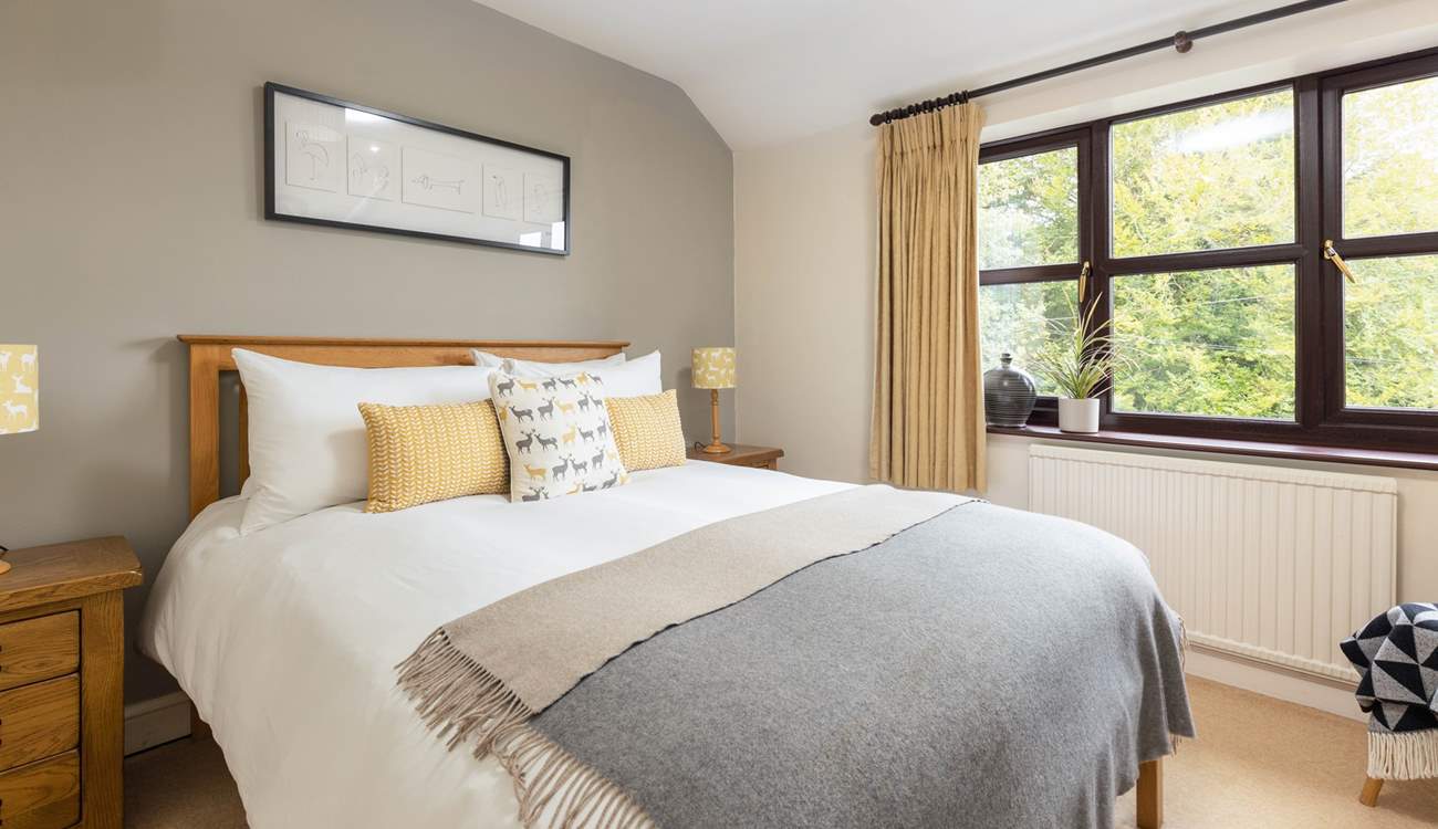 Bedroom two is simply so pretty and inviting.