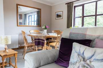 The living area offers a second spot to dine in.