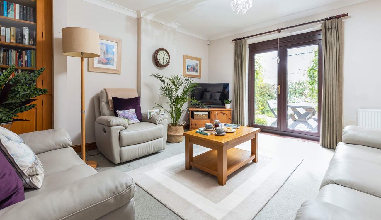 Swing the patio doors open and step out onto your sun-trap patio area.