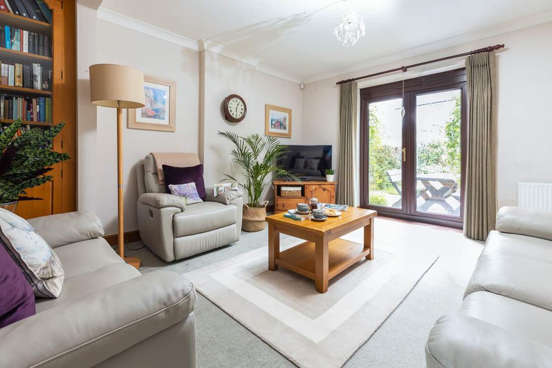 Swing the patio doors open and step out onto your sun-trap patio area.