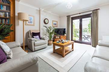 Swing the patio doors open and step out onto your sun-trap patio area.